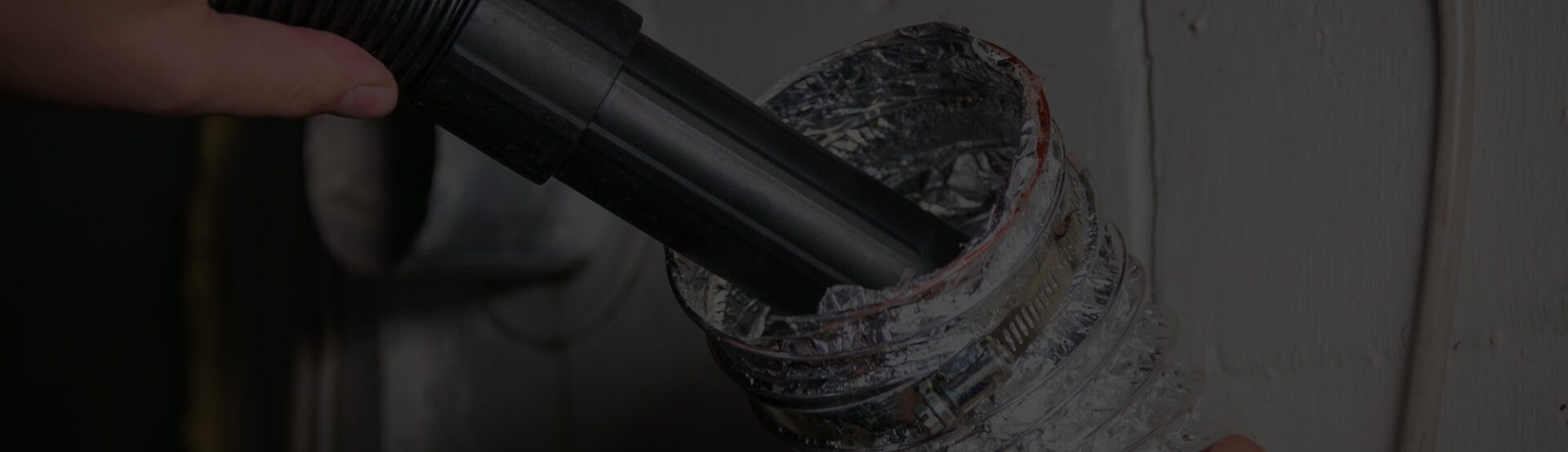 Technician working on duct system