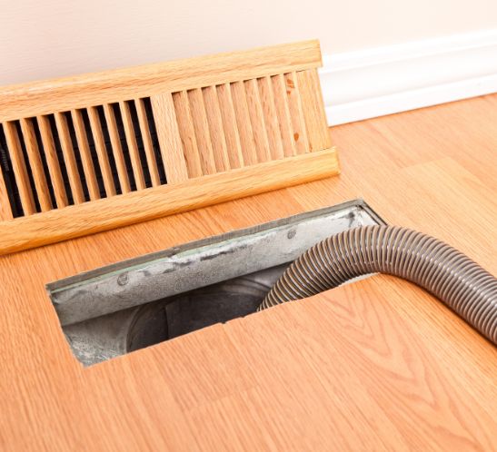 Clean HVAC air duct system in a home